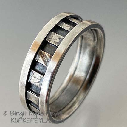 Wide Striped ring with raised outer edges
